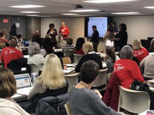 Volunteers score proposal submissions for the 2019 conference